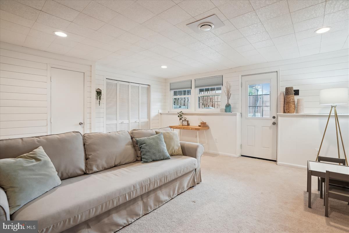 13964 Winding Ridge Lane Centreville, VA 20121 - Photo 32 of 48 Lower level rec room with sofa bed closed