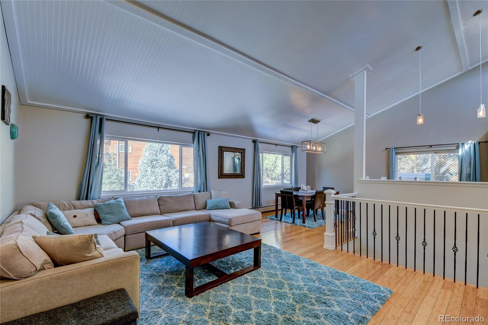 6359 Powell Road Parker, CO 80134 - Photo 16 of 38 a living room with furniture and a window