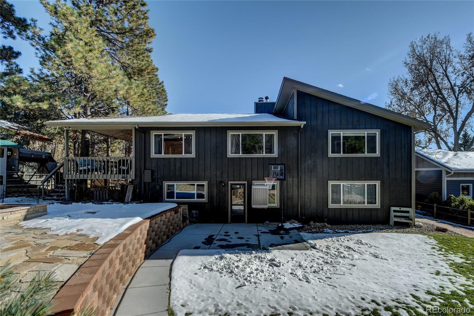 6359 Powell Road Parker, CO 80134 - Photo 30 of 38 a front view of a house with a yard