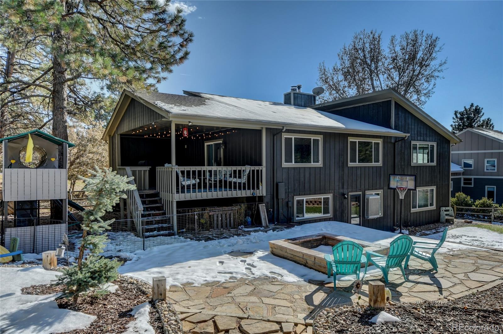 6359 Powell Road Parker, CO 80134 - Photo 32 of 38 a front view of a house with garden