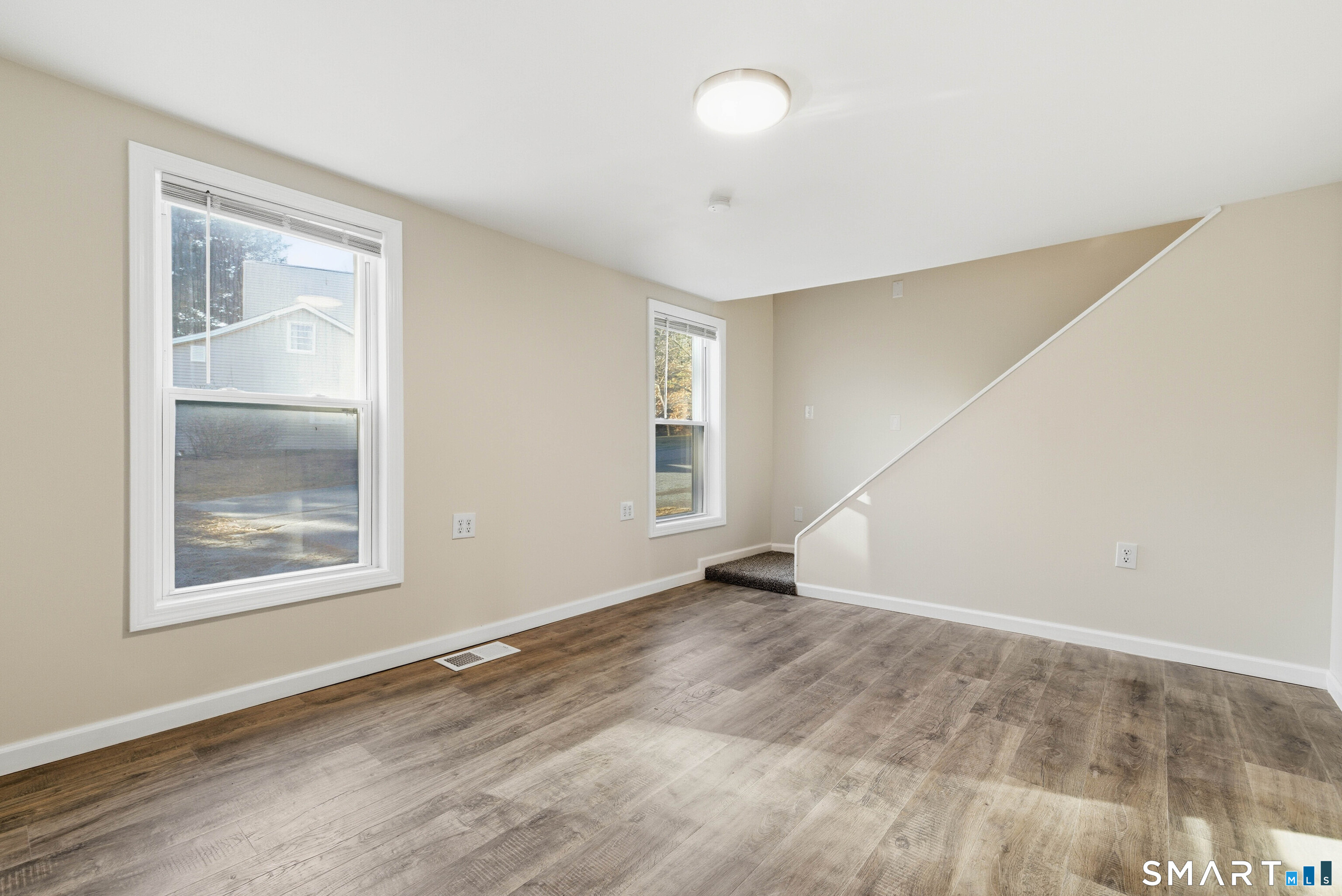 40 Tarbox Road Plainfield, CT 06374 - Photo 21 of 33 an empty room with windows and closet