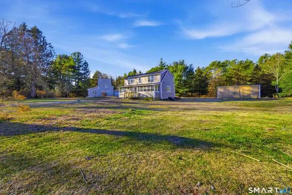 a house view with a garden space