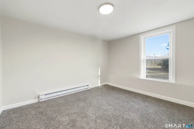an empty room with a window