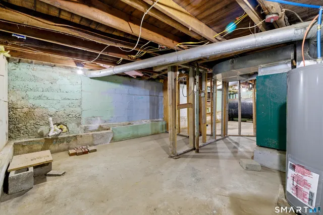 a view of a room with wooden walls