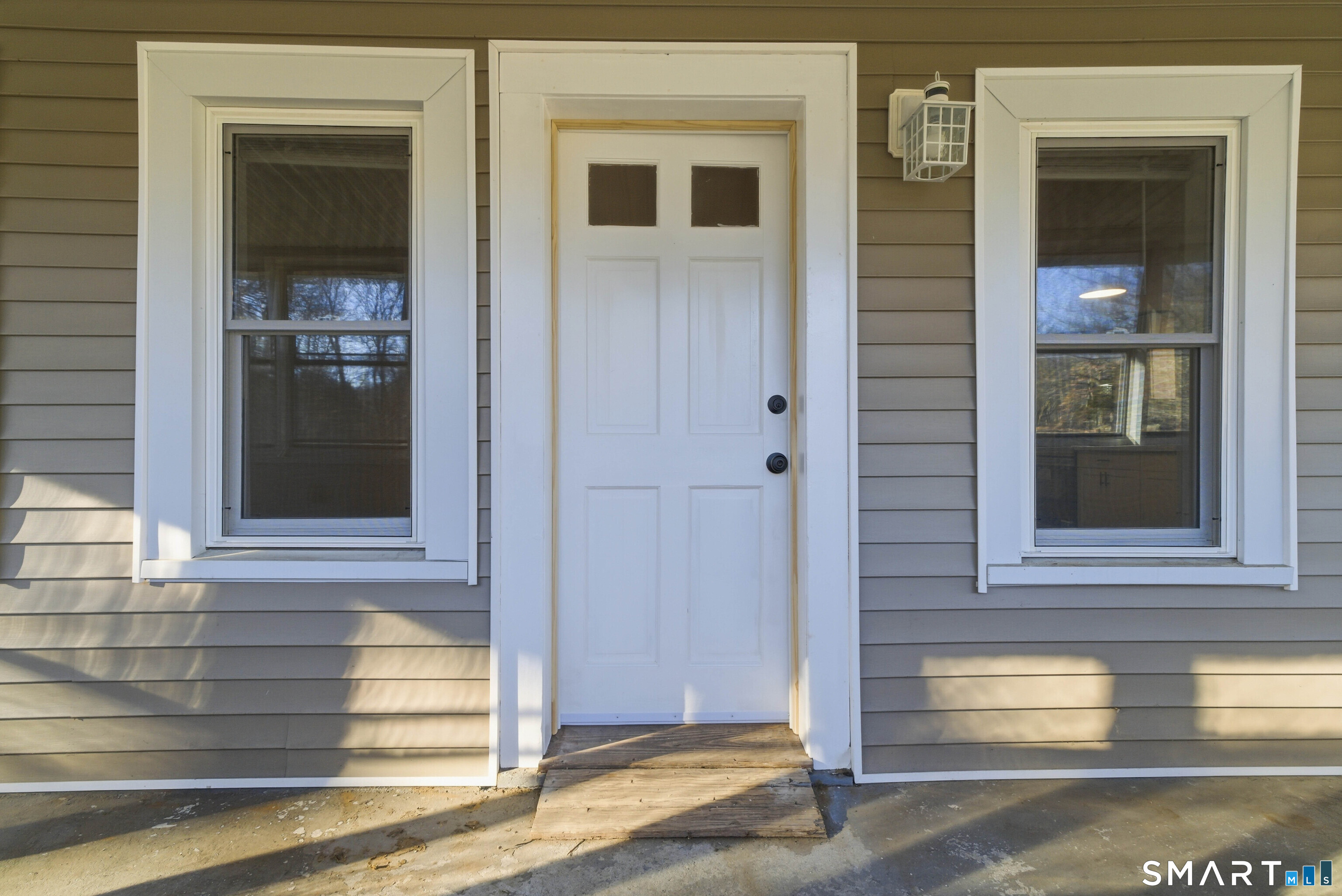 40 Tarbox Road Plainfield, CT 06374 - Photo 4 of 33 front view of a brick house with a large windows