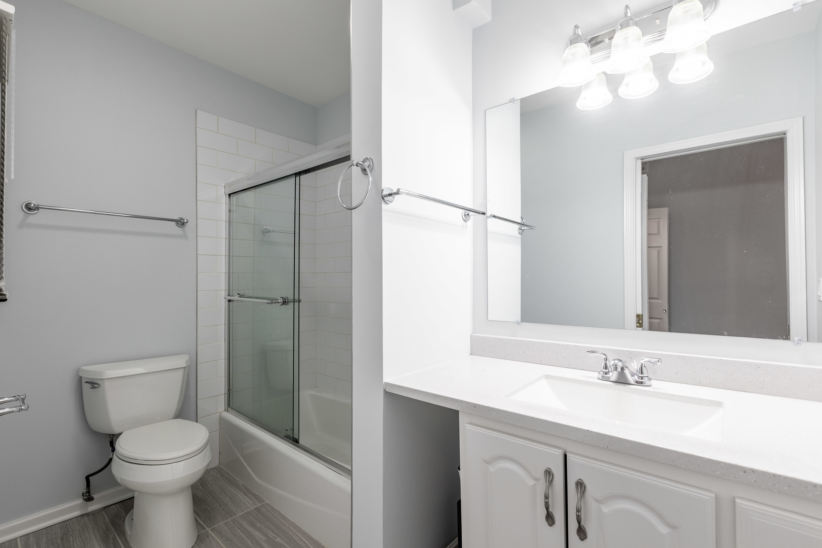 1133 West Madison Street, Unit 2R Chicago, IL 60607 - Photo 14 of 15 a bathroom with a sink a toilet and shower