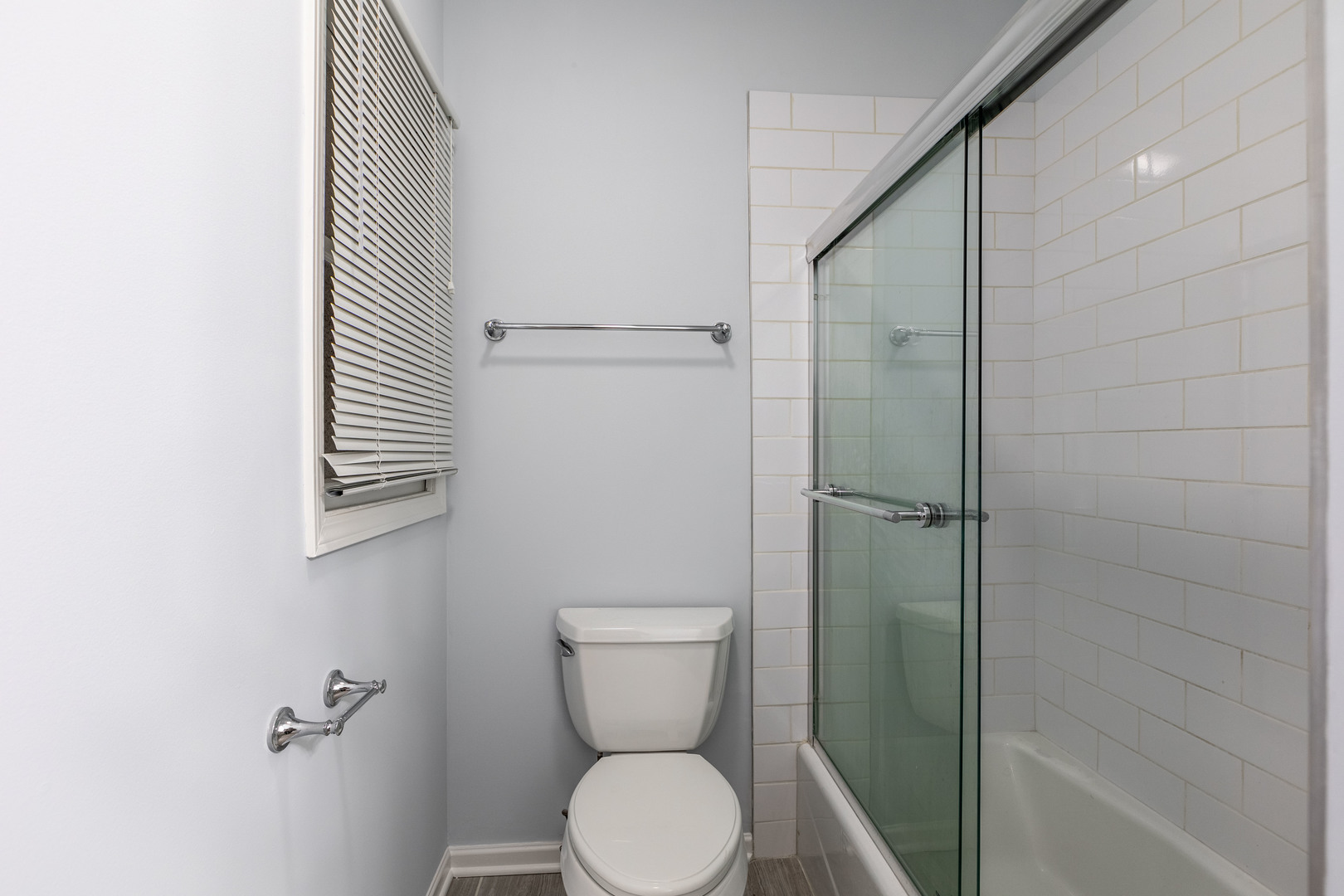 1133 West Madison Street, Unit 2R Chicago, IL 60607 - Photo 15 of 15 a bathroom with a toilet and a shower