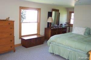 8741 Jenks Road Harbor Beach, MI 48441 - Photo 5 of 6 one of the upstairs bedrooms