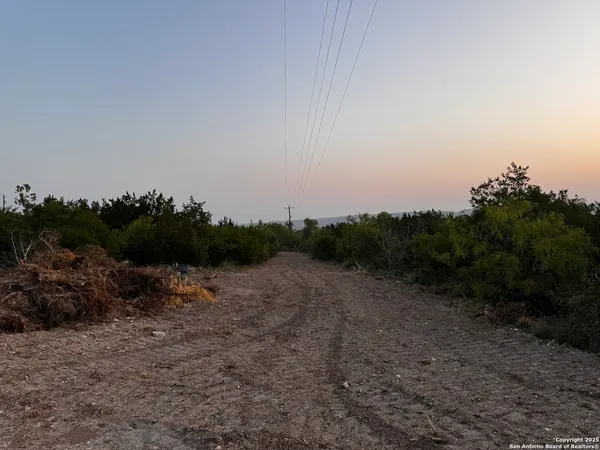 a view of a road with a light house