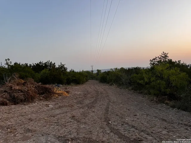 a view of a road with a light house