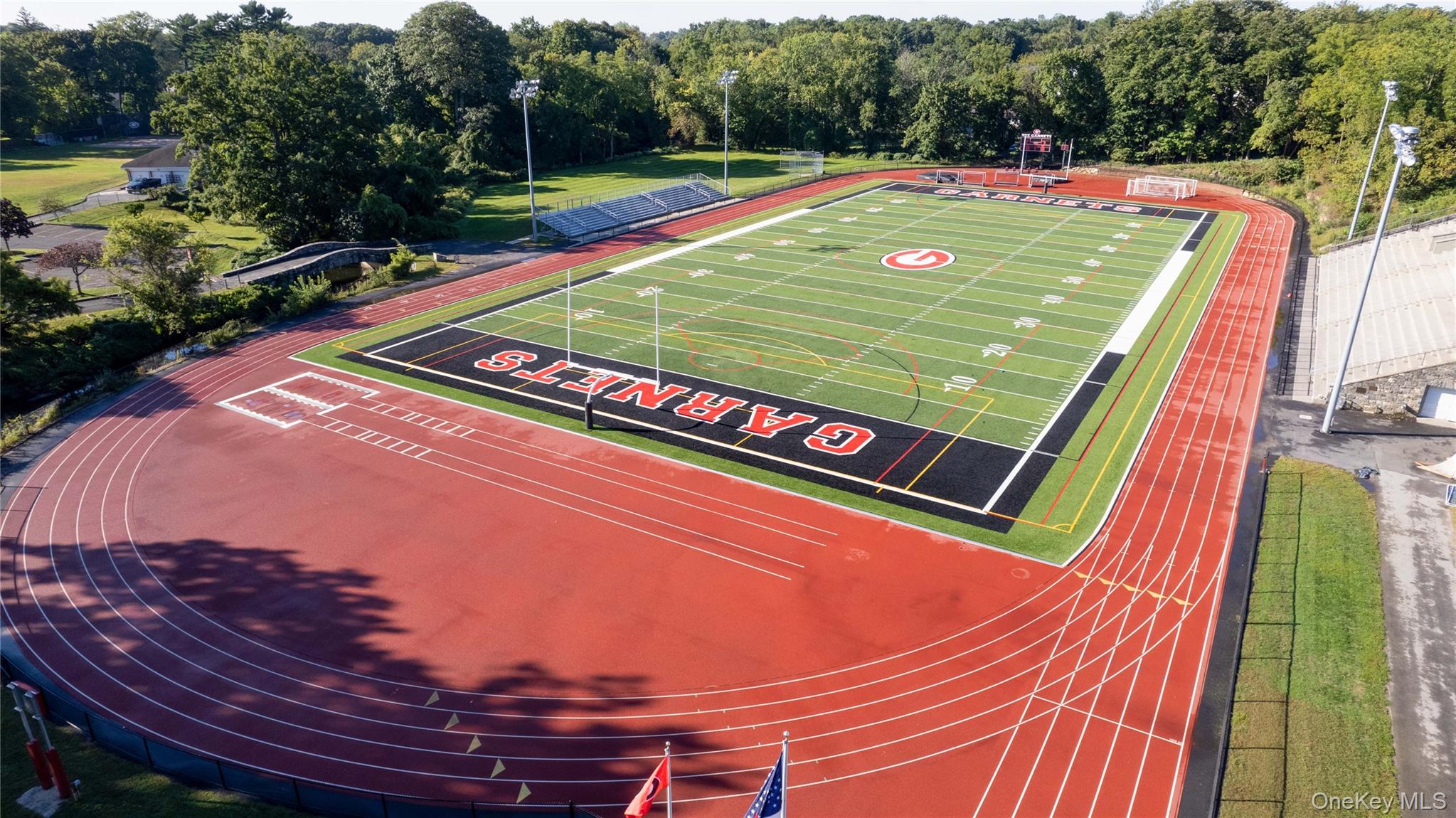 28 Everett Street Rye, NY 10580 - Photo 15 of 21 a view of a tennis ground with large trees