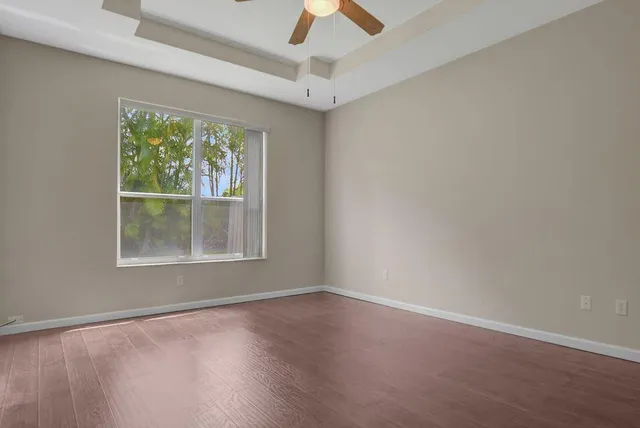 a bathroom with a sink a mirror and a toilet