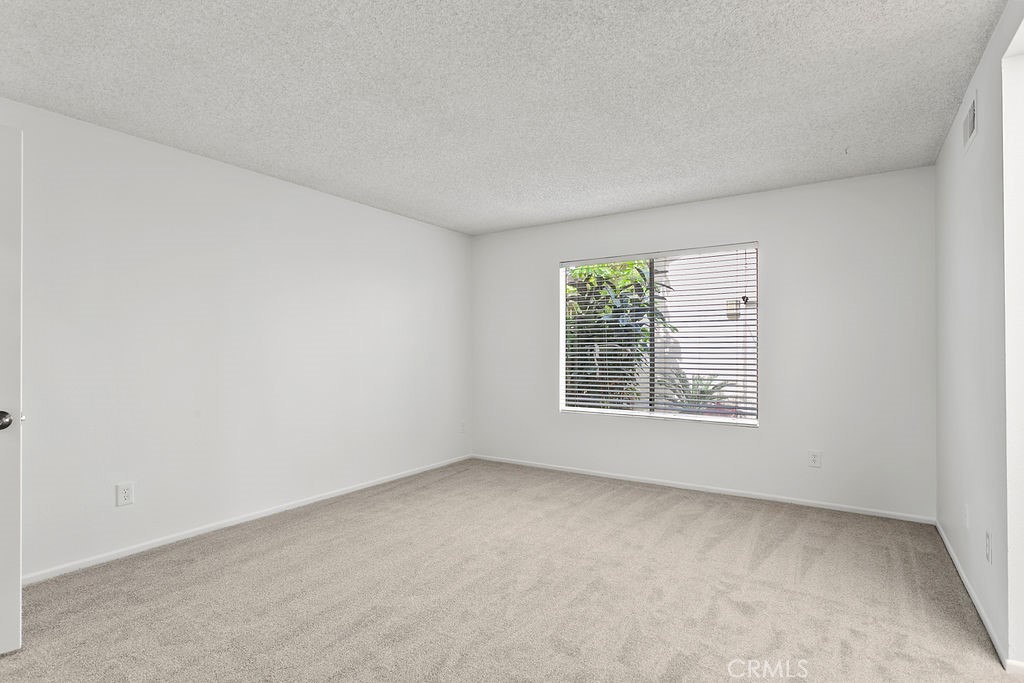 1 Autumn Oak Irvine, CA 92604 - Photo 14 of 17 Primary Bedroom with atrium view