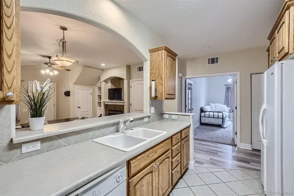 a spacious bathroom with a sink a large mirror and a shower