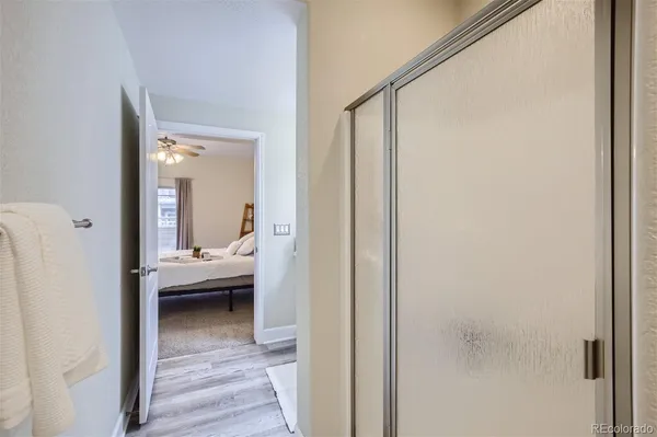 a view of a bedroom from a hallway