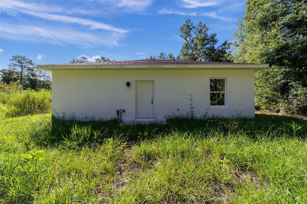 15431 Southwest 41st Street Road Ocala, FL 34481 - Photo 41 of 44 a view of a backyard