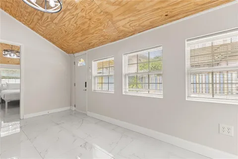 a bathroom with a sink a vanity and bathtub