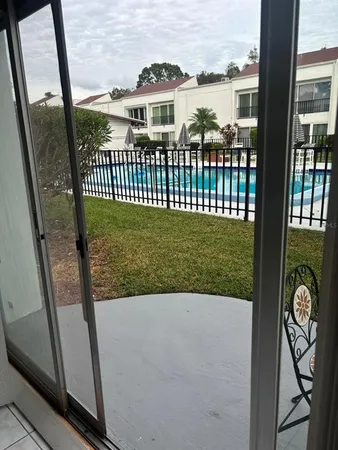 a view of a porch with a yard