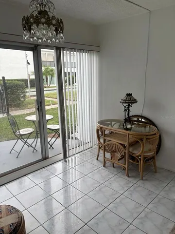 a view of a porch with a yard