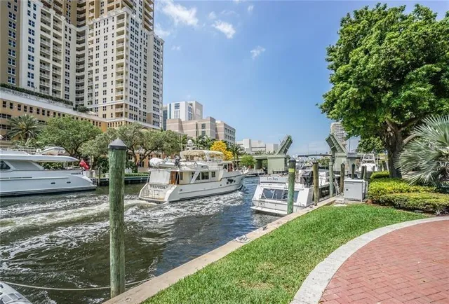 a view of a lake with a building and outdoor space