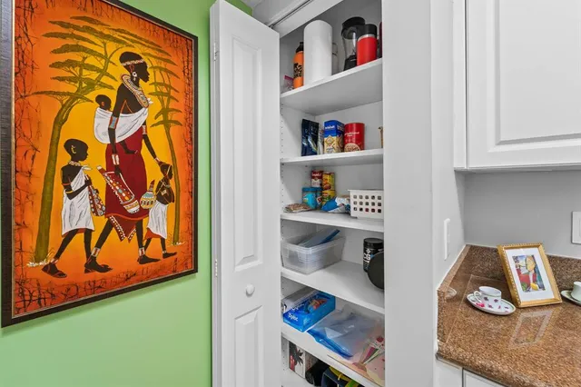 a room with toys and a book shelf