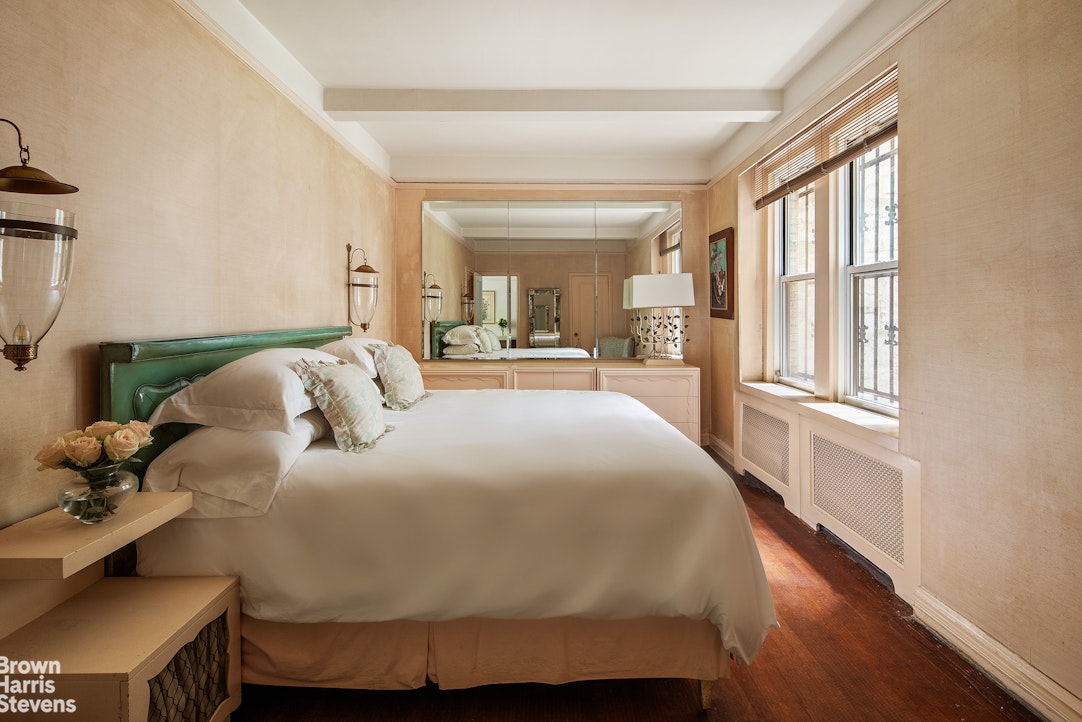 435 East 57th Street, Unit 2A Manhattan, NY 10022 - Photo 3 of 9 a bedroom with a bed and window