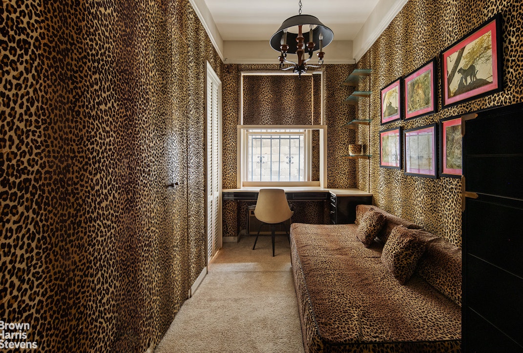 435 East 57th Street, Unit 2A Manhattan, NY 10022 - Photo 5 of 9 a living room with furniture