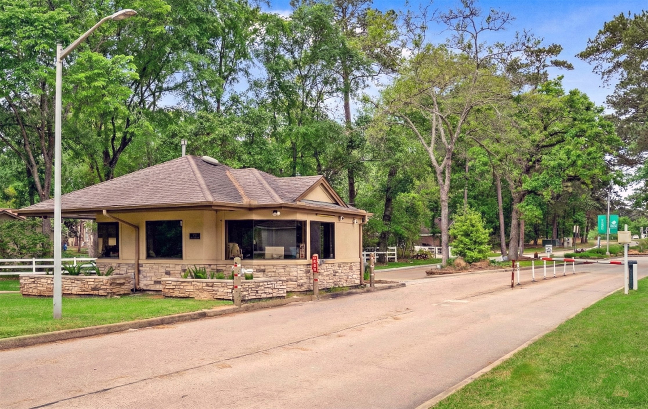 80 Summers Wind Street Conroe, TX 77356 - Photo 10 of 13 a house view with a sitting space and garden view