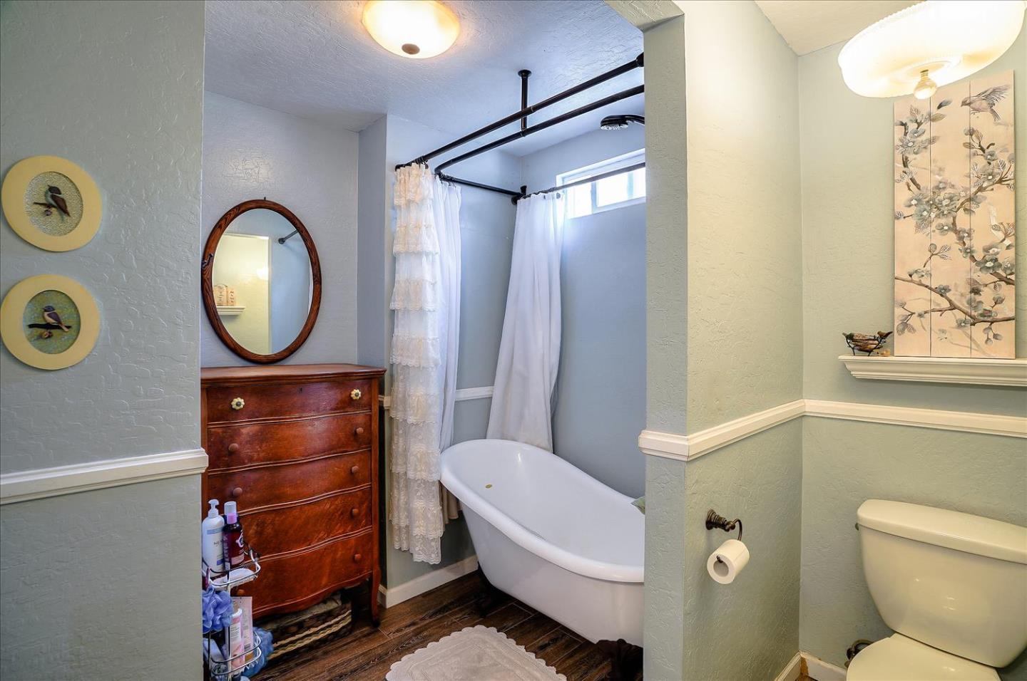 781 5th Street Gilroy, CA 95020 - Photo 16 of 33 a bathroom with a toilet a sink and a mirror