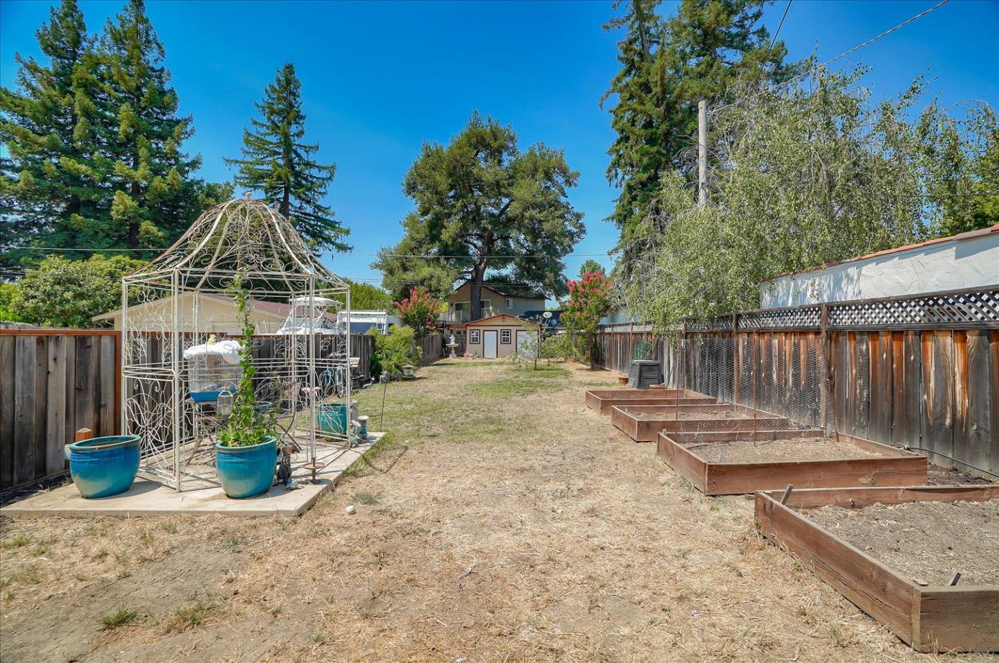 781 5th Street Gilroy, CA 95020 - Photo 21 of 33 a front view of a house with a garden