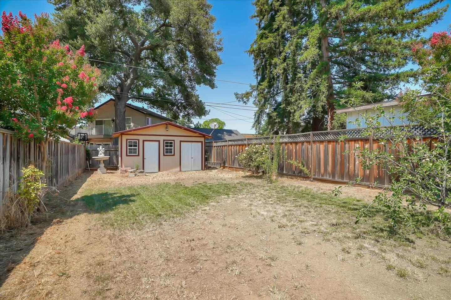 781 5th Street Gilroy, CA 95020 - Photo 22 of 33 a view of a house with wooden fence