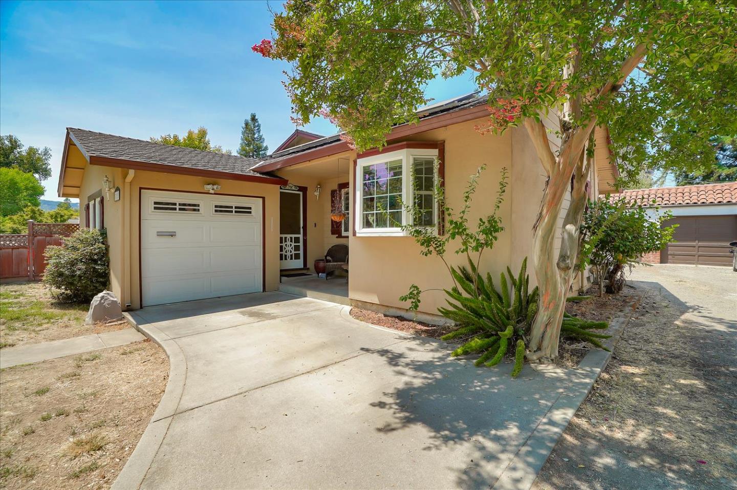 781 5th Street Gilroy, CA 95020 - Photo 3 of 33 a view of a house with a yard and plants