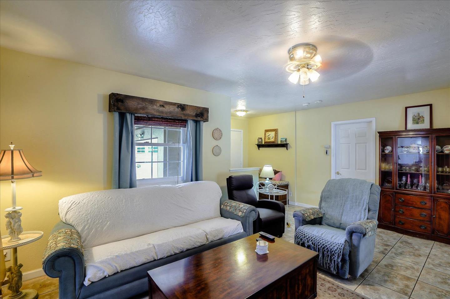 781 5th Street Gilroy, CA 95020 - Photo 5 of 33 a living room with furniture and a window