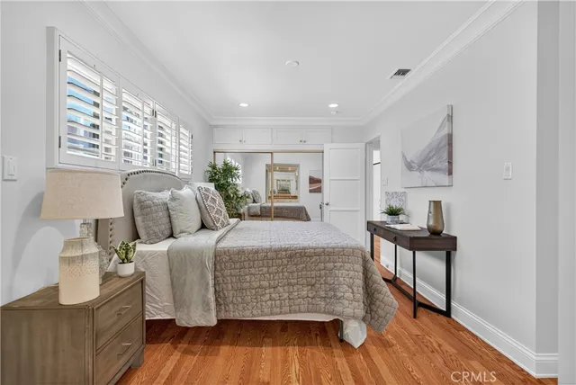 a bed room with bed and window