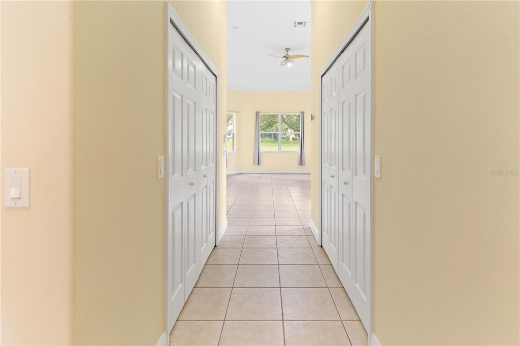 2718 Knightsbridge Road Clermont, FL 34711 - Photo 13 of 32 a view of a hallway with a window