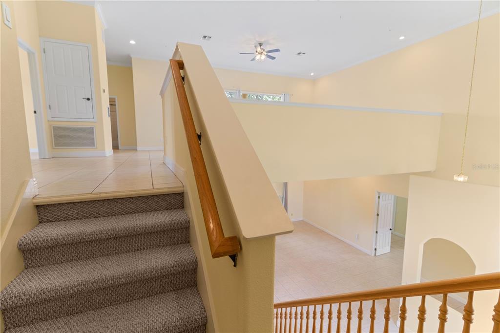 2718 Knightsbridge Road Clermont, FL 34711 - Photo 14 of 28 a view of entryway and hall with wooden floor