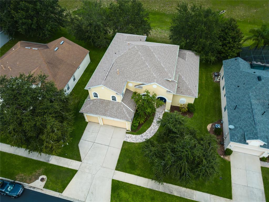 2718 Knightsbridge Road Clermont, FL 34711 - Photo 2 of 28 an aerial view of a house