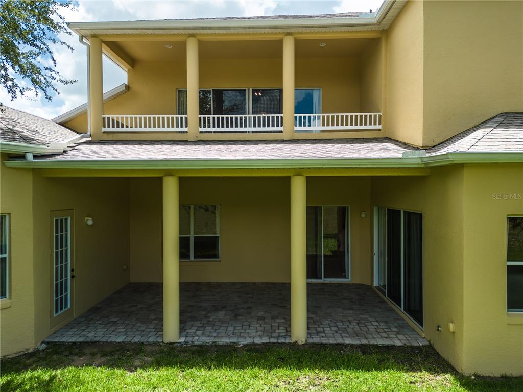 2718 Knightsbridge Road Clermont, FL 34711 - Photo 22 of 28 a view of front door of house