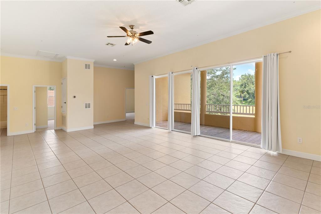 2718 Knightsbridge Road Clermont, FL 34711 - Photo 4 of 28 a view of an empty room with a window