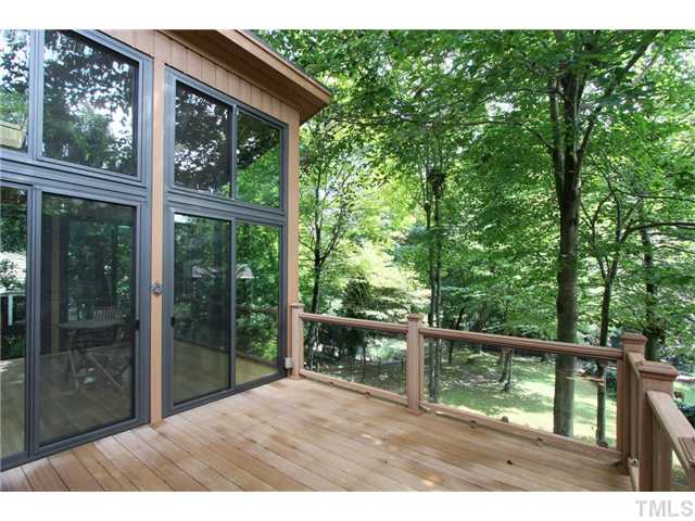 6248 Rushingbrook Drive Raleigh, NC 27612 - Photo 11 of 25 a balcony with wooden floor and outdoor space