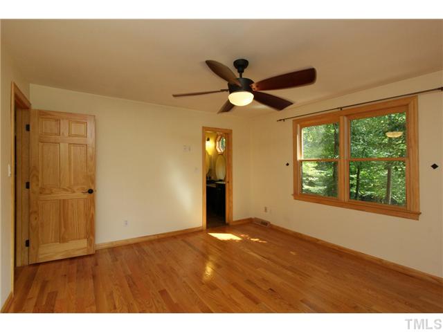 6248 Rushingbrook Drive Raleigh, NC 27612 - Photo 15 of 25 a view of an empty room and window