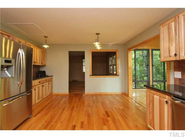 6248 Rushingbrook Drive Raleigh, NC 27612 - Photo 5 of 25 a view of kitchen with furniture and large window