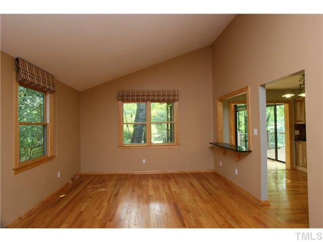 6248 Rushingbrook Drive Raleigh, NC 27612 - Photo 8 of 25 a view interior of a house wooden floor and windows