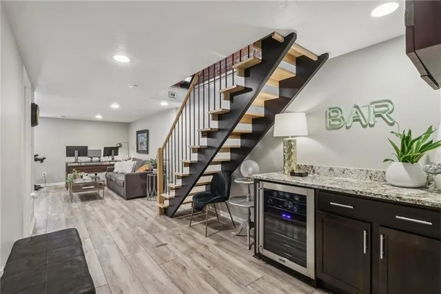 a view of entryway and kitchen