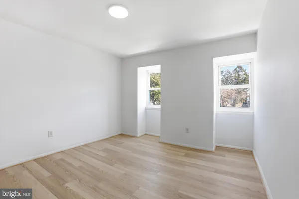 an empty room with windows
