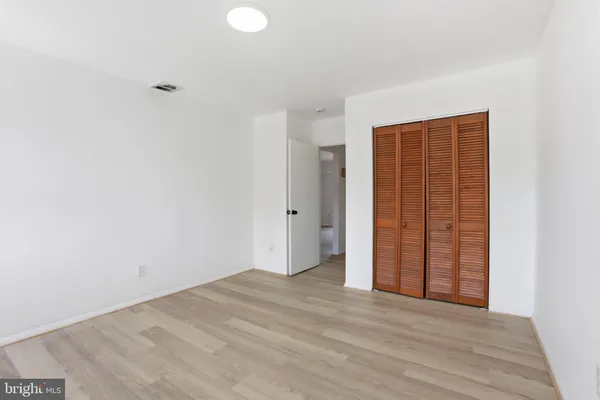 an empty room with closet
