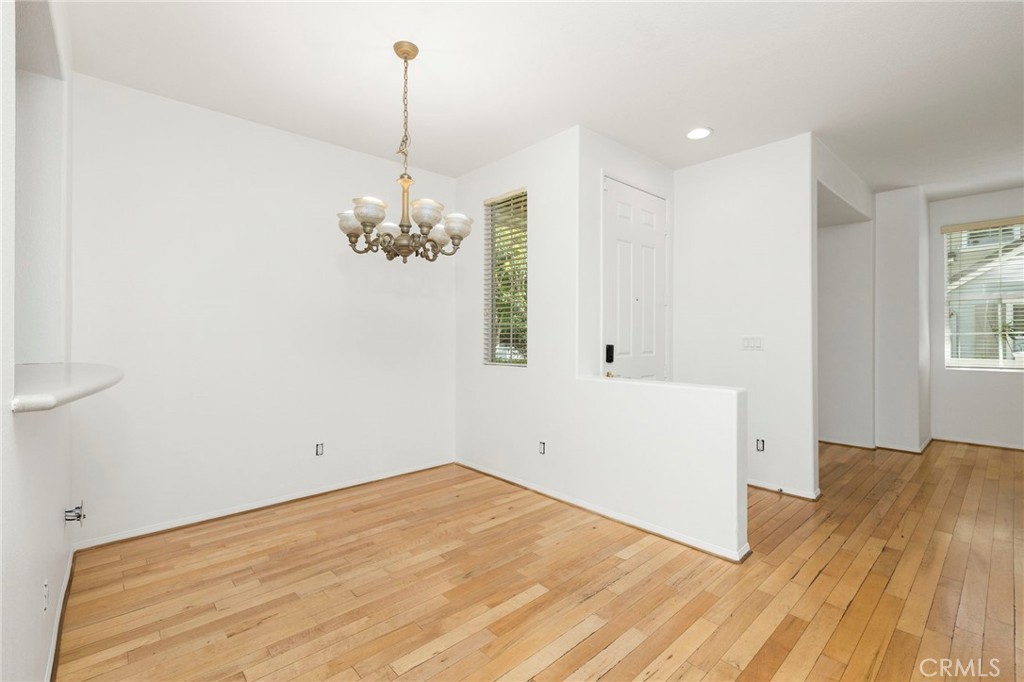 Separate dining area and eat up bar or pass through to the kitchen.