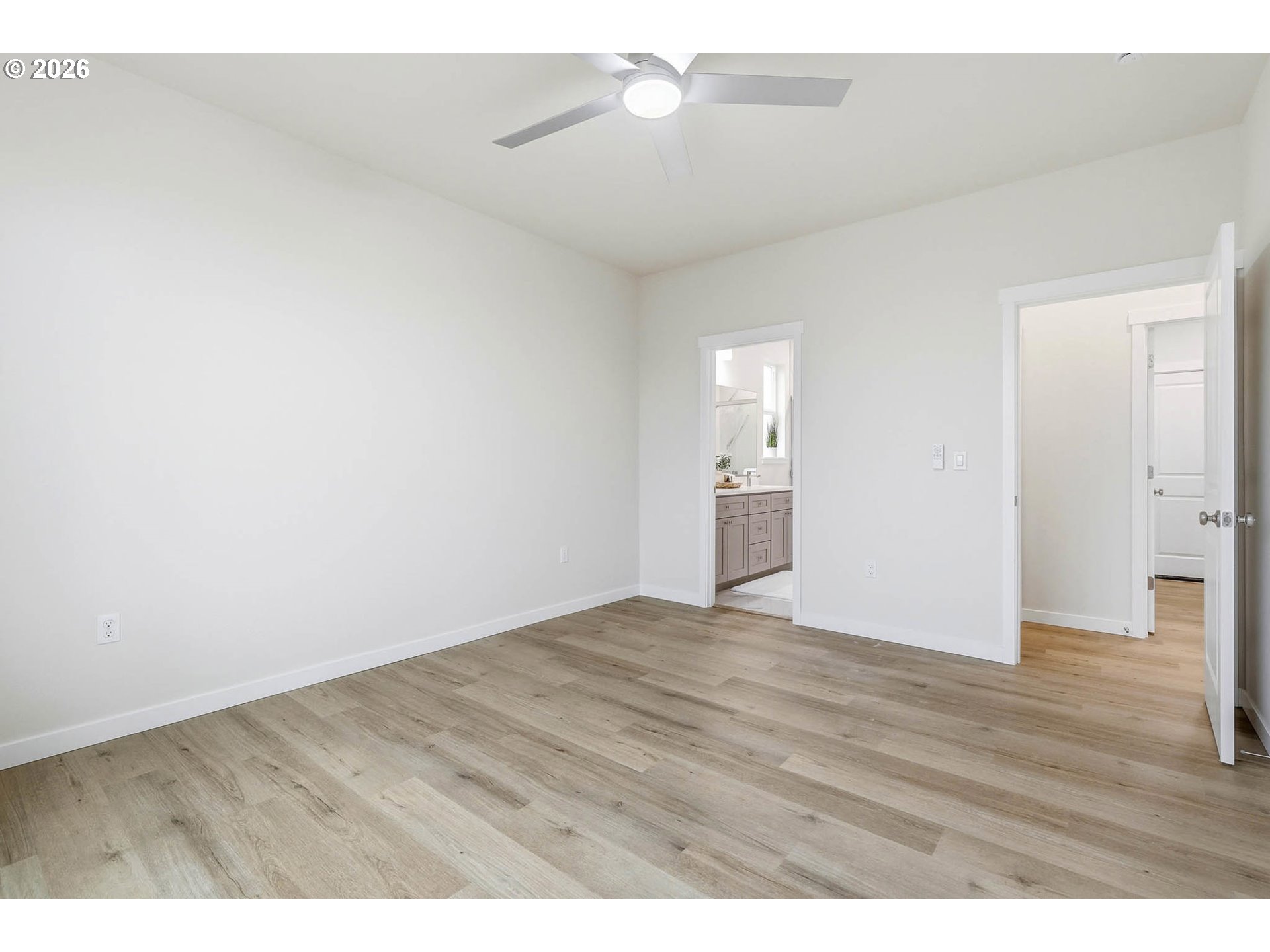 1327 Southeast 9th Street Hermiston, OR 97838 - Photo 19 of 28 a view of an empty room and wooden floor