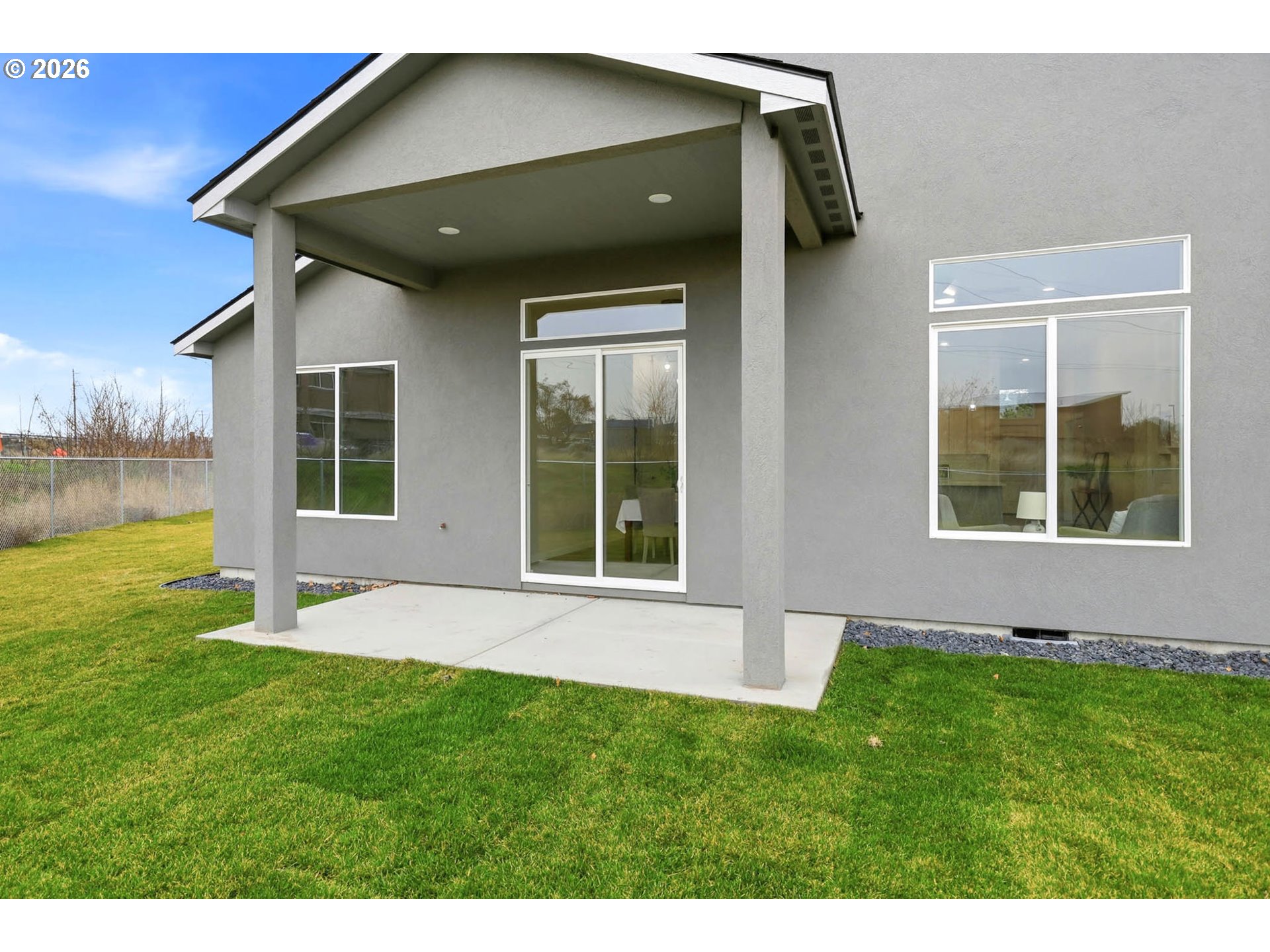 1327 Southeast 9th Street Hermiston, OR 97838 - Photo 22 of 28 a house that has a big yard in front of it