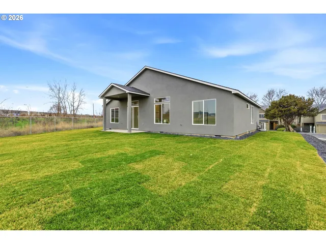 a house view with a outdoor space